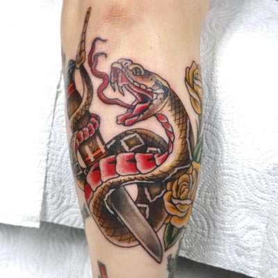 Sydney has always liked snakes so naturally her stake tattoos are very detailed and realistic